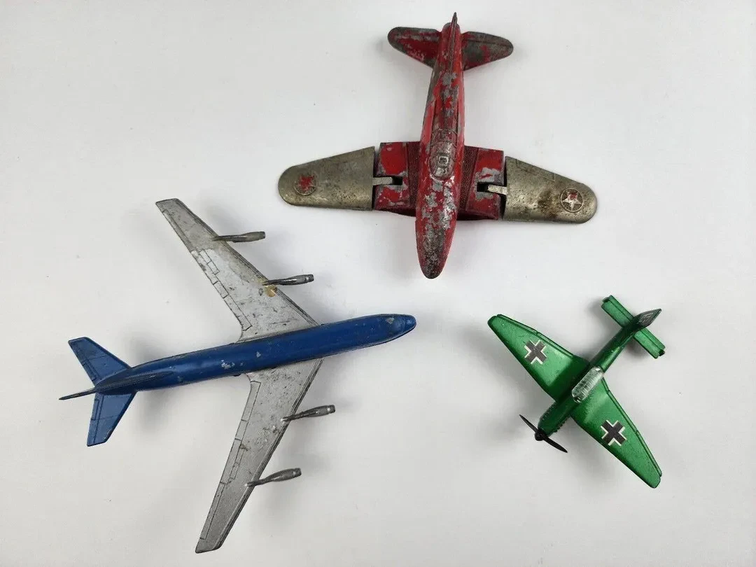 Toy store shelf with diecast airplanes