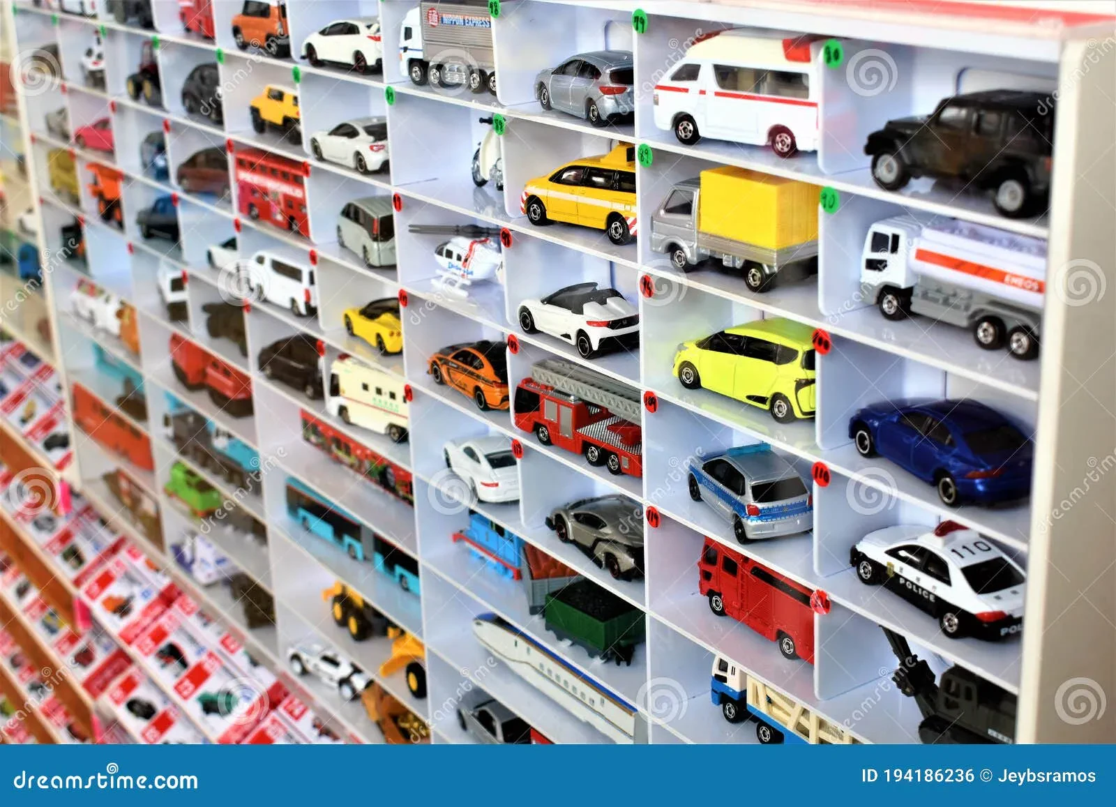 Multiple diecast cars displayed